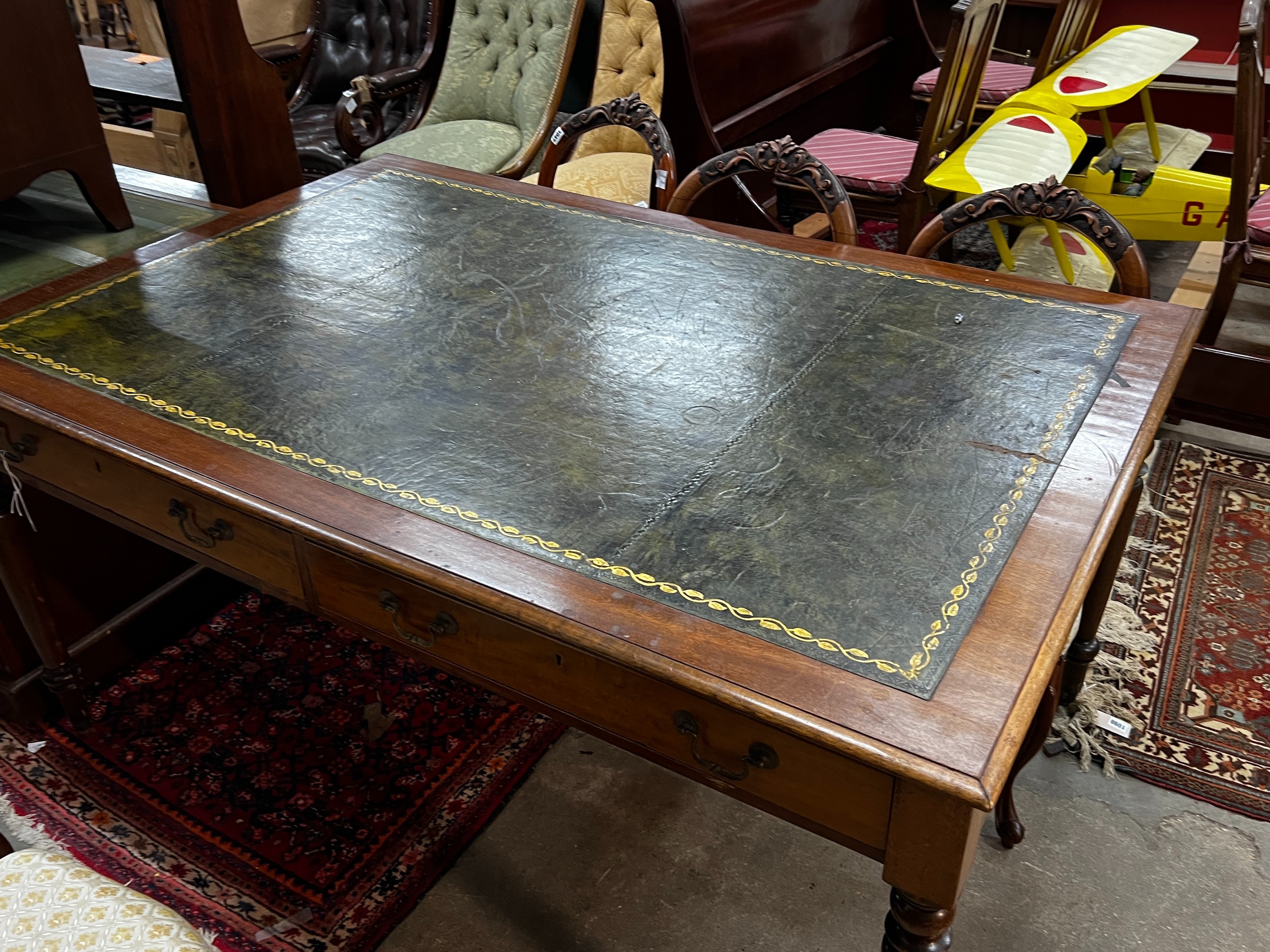 A Victorian style mahogany partner's writing table, width 154cm, depth 102cm, height 79cm